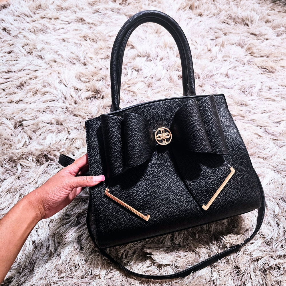 Elegant Black Handbag with Bow Accent
